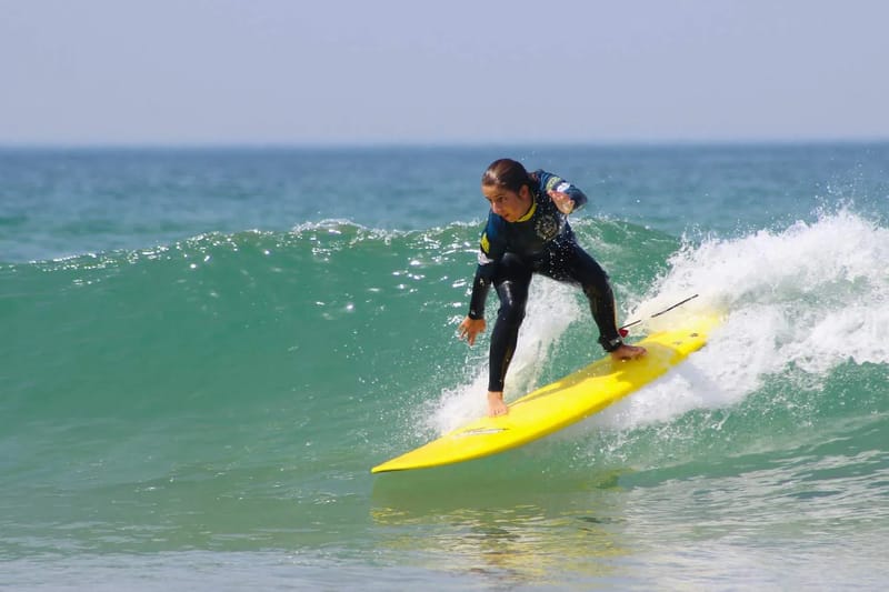 Surf lesson in the water at Costa da Caparica