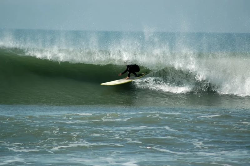 Surfer at Fonte da Telha